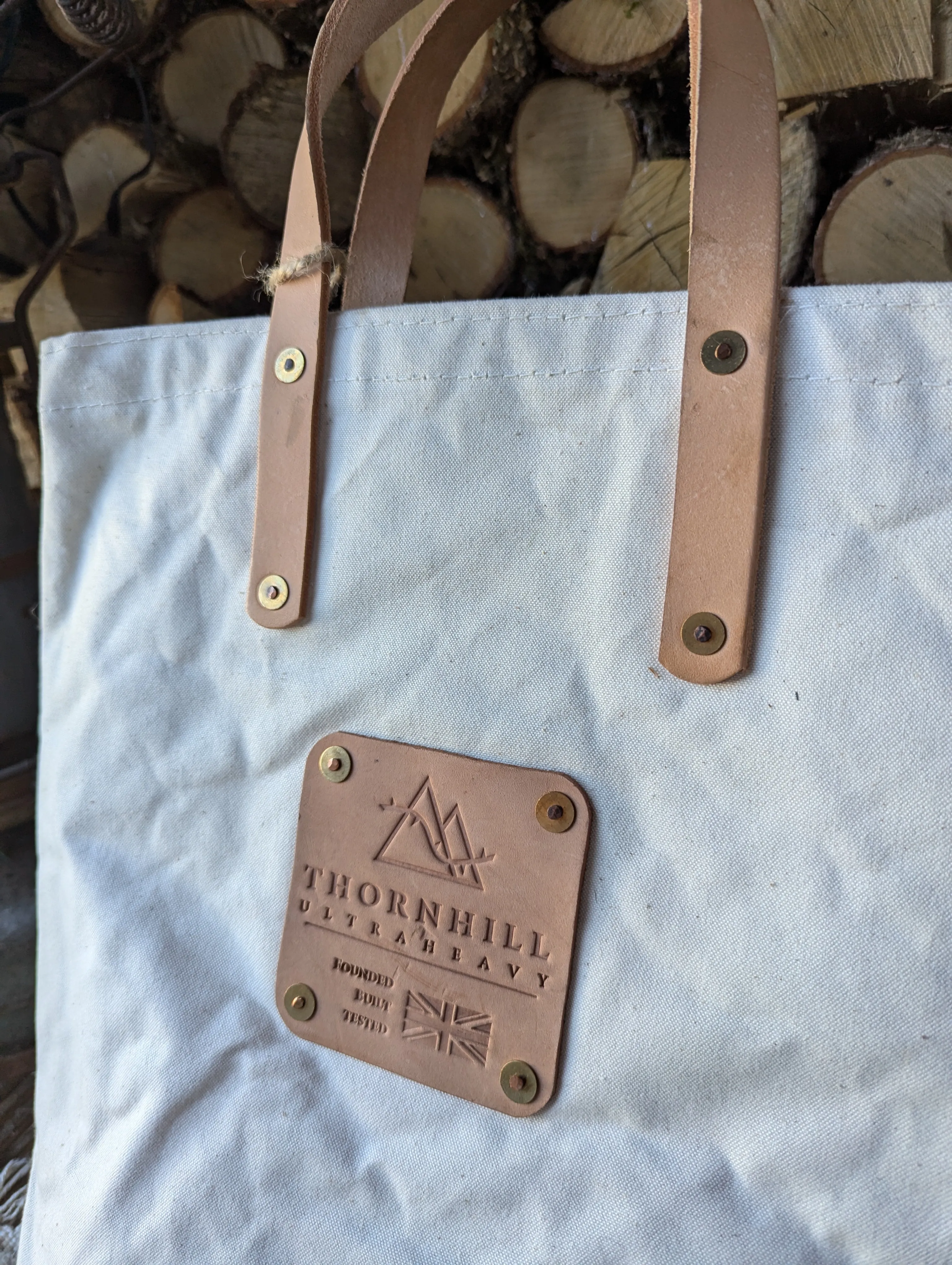 Tote bags, double-lined denim or canvas with leather handles